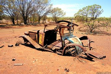 Rusty car on Kookynie-Malcolm Road, Western Australia